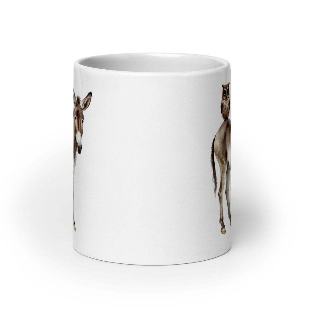 White ceramic coffee mug with an image of a donkey with wise owl sitting on it printed on both sides of the mug.