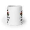 White ceramic coffee mug with images of mushrooms and the text 'If mushrooms can grow from shit so can you' printed on both sides.