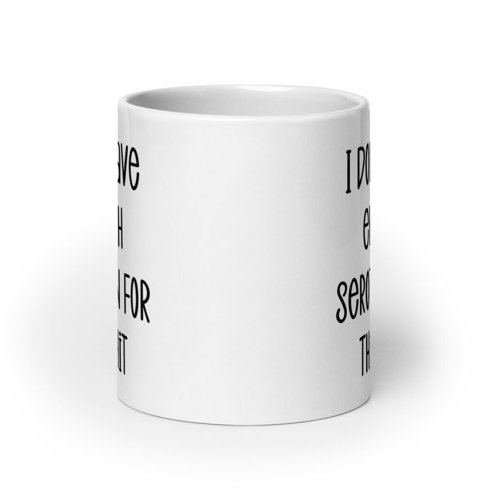 White ceramic coffee mug with the text 'I don't have enough serotonin for this shit' printed on both sides.