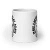 White ceramic coffee mug with an image of an alien holding a flat earth and the phrase 'Make earth flat again' printed on both sides.