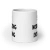 White ceramic coffee mug with the text 'Stop normalizing everything' printed on both sides.