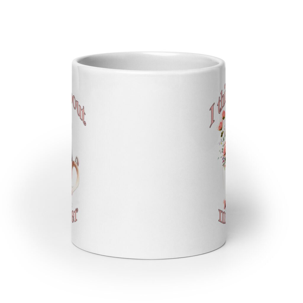 White ceramic mug that says 'I think about murder' with image of cute fluffy kitten sitting in a teacup printed on both sides.