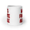 White ceramic mug with the text 'Mom's favorite asshole' printed in red on both sides of the mug.