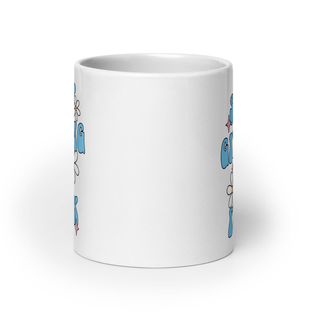 White ceramic coffee mug with a retro daisy and star design and the text 'Stop giving a fuck' printed on both sides.