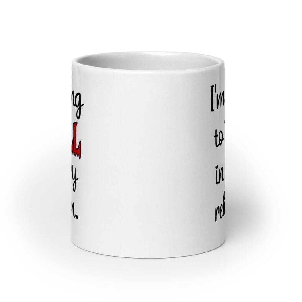 White ceramic mug with the text 'I'm going to hell in every religion' printed on both sides.