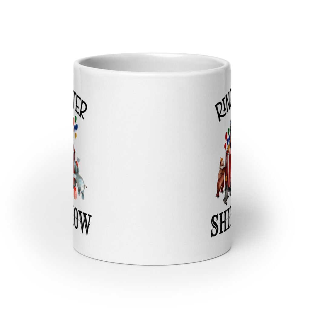 White ceramic coffee mug with a circus theme graphic and the text 'Ringmaster of the Shitshow' printed on both sides.