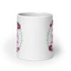 White ceramic coffee mug that has a colorful minimalistic style line drawing floral wreath with the text 'Sometimes I pee a little when I laugh' printed in the center of the wreath. The graphics are printed on both sides of the mug.