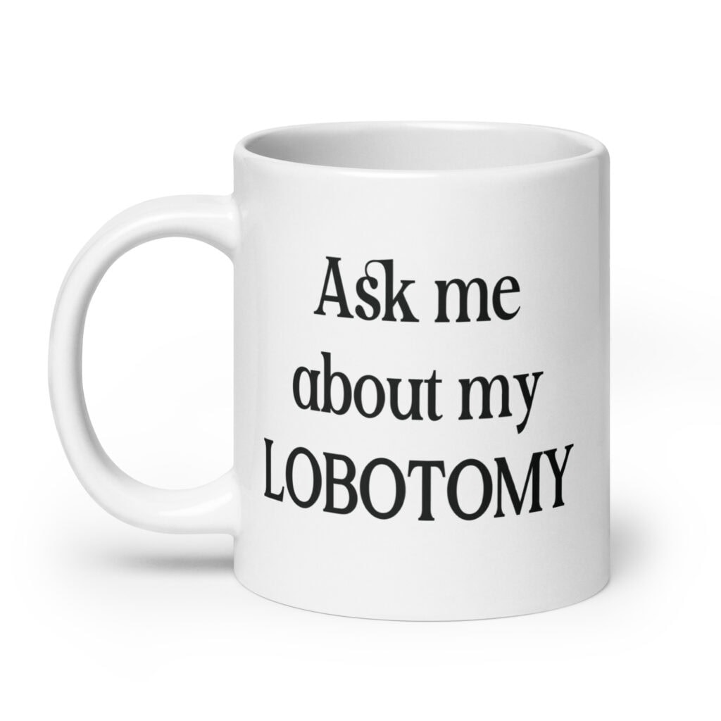 White ceramic mug with the text 'Ask me about my lobotomy' printed on both sides.