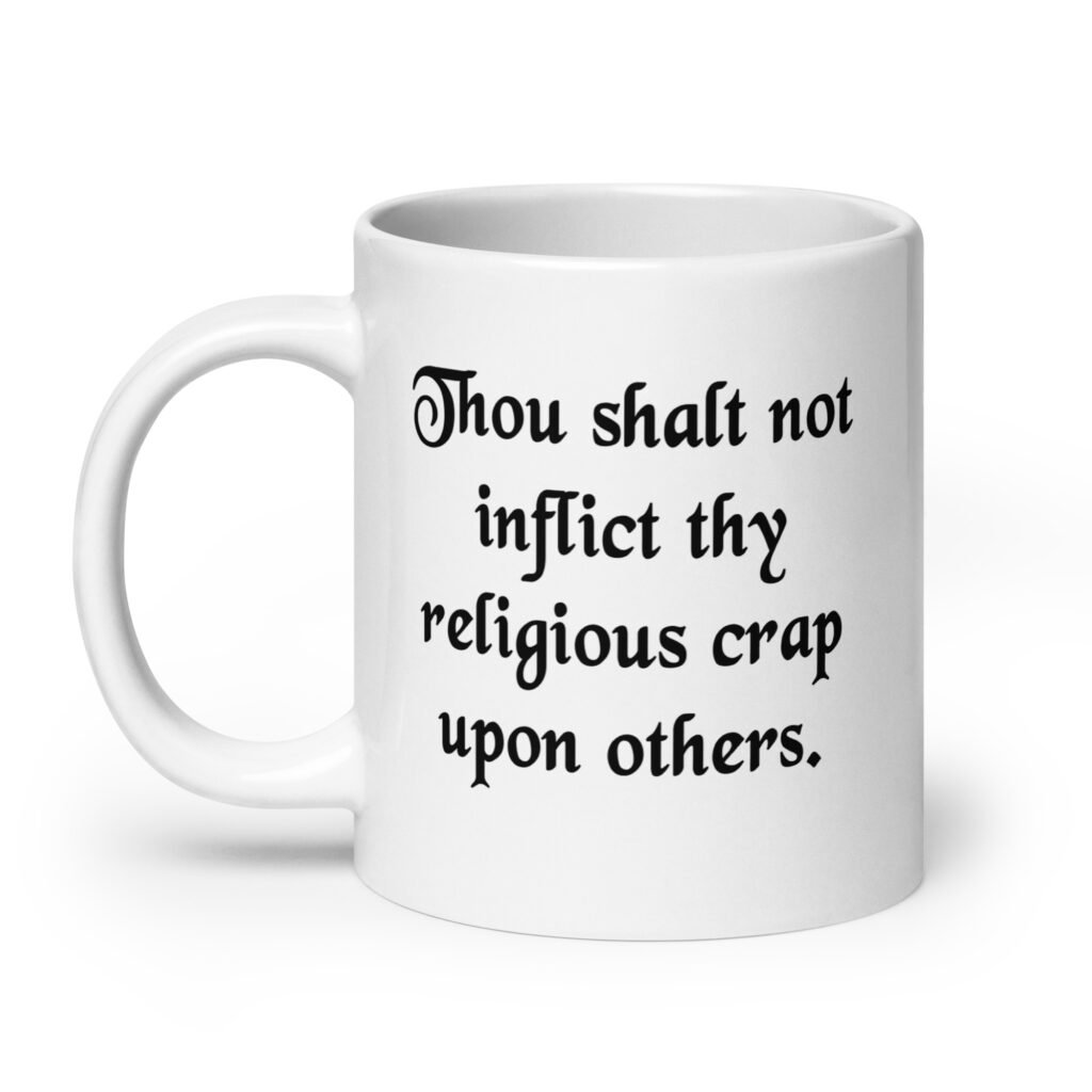 White biblical satire mug with the phrase 'Thou shalt not inflict thy religious crap upon others' printed on both sides.