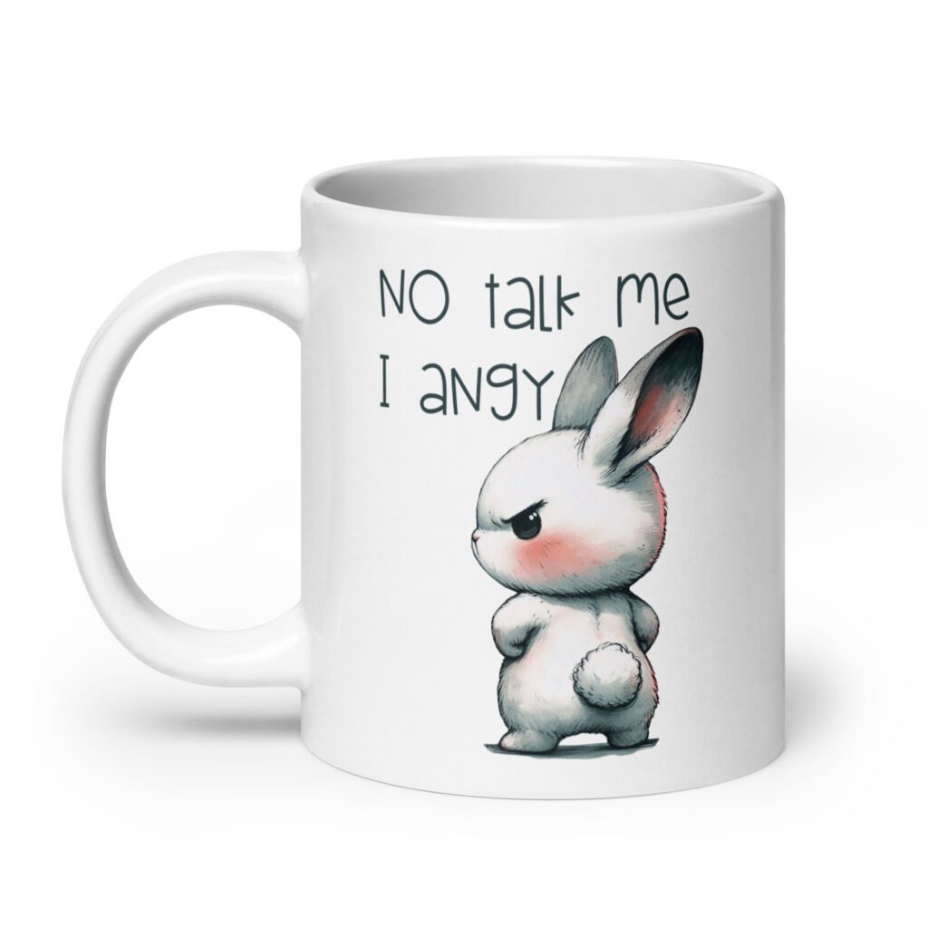 White ceramic coffee mug with an image of an angry bunny and the text 'No talk me I angy' printed on both sides of the mug.