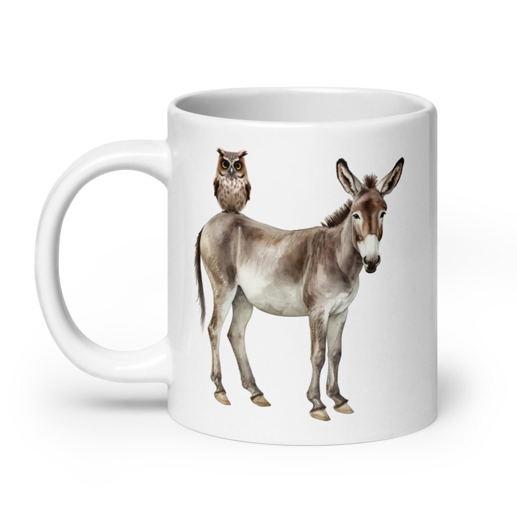 White ceramic coffee mug with an image of a donkey with wise owl sitting on it printed on both sides of the mug.