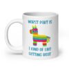 White ceramic coffee mug with an image of a colorful donkey pinata with the words 'Worst part is I kind of like getting beat' printed on both sides.