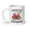 White ceramic coffee mug with a circus theme graphic and the text 'Ringmaster of the Shitshow' printed on both sides.