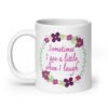 White ceramic coffee mug that has a colorful minimalistic style line drawing floral wreath with the text 'Sometimes I pee a little when I laugh' printed in the center of the wreath. The graphics are printed on both sides of the mug.