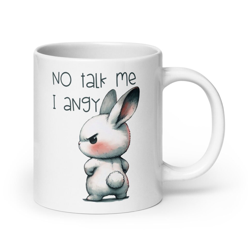 White ceramic coffee mug with an image of an angry bunny and the text 'No talk me I angy' printed on both sides of the mug.