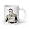 White ceramic coffee mug with graphic of retro man holding sign that says 'Ladies, mansplaining is short for man explaining' printed on both sides.