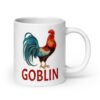 White ceramic coffee mug with an image of a rooster and the word 'Goblin' printed under the rooster. The graphics are printed on both sides of the mug.