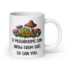 White ceramic coffee mug with images of mushrooms and the text 'If mushrooms can grow from shit so can you' printed on both sides.