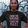 Woman wearing black t-shirt with the text 'I have the vagina. I make the rules' printed on the front.