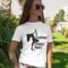 Woman wearing a white stripper humor tshirt with image of pole dancer and the text 'I support single moms' printed on the front.