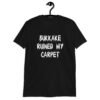Black t-shirt with the text 'Bukkake ruined my carpet' in drippy font printed on the front.
