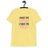 Cornsilk yellow t-shirt with the text 'I have the vagina. I make the rules' printed on the front.