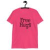 Heliconia pink t-shirt with the text 'Free Hugs' printed on the front.