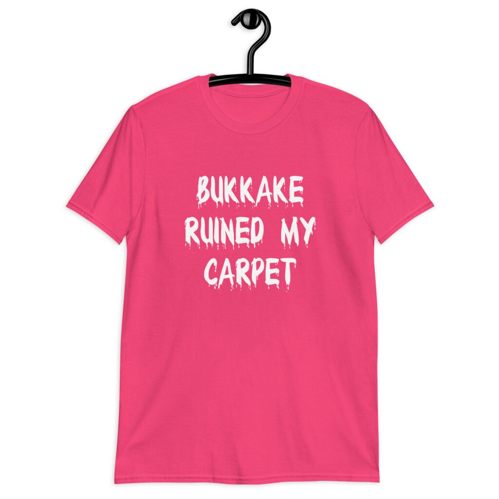 Heliconia pink t-shirt with the text 'Bukkake ruined my carpet' in drippy font printed on the front.