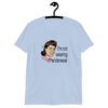 Light blue t-shirt with an image of a retro woman and the text 'I'm not wearing underwear' printed on the front.
