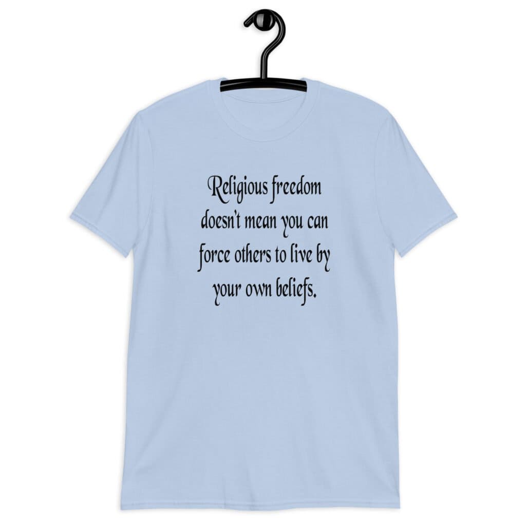 Light blue t-shirt with the text 'Religious freedom doesn't mean you can force others to live by your own beliefs.' printed on the front.