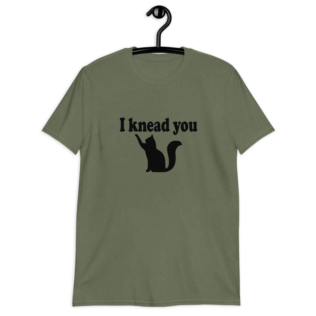 Military green t-shirt that has an image of a silhouette of a cat and the text 'I knead you' printed on the front.