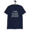 Navy blue t-shirt with the text 'I see stupid people' printed on the front.