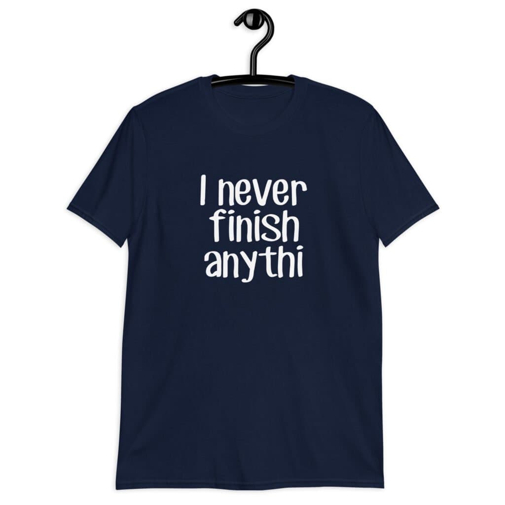 Navy blue t-shirt with the text 'I never finish anyth' printed on the front.