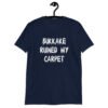 Navy blue t-shirt with the text 'Bukkake ruined my carpet' in drippy font printed on the front.