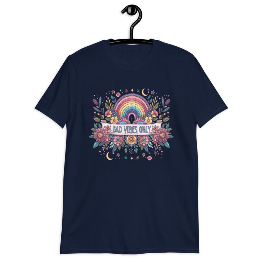 Navy blue t-shirt with colorful boho floral design and the test 'Bad vibes only' printed on the front.