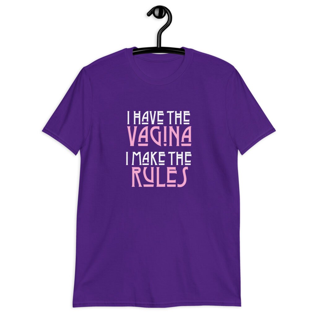 Purple t-shirt with the text 'I have the vagina. I make the rules' printed on the front.