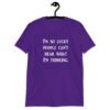 Purple t-shirt with the text 'I'm so lucky people can't hear what I'm thinking' printed on the front.