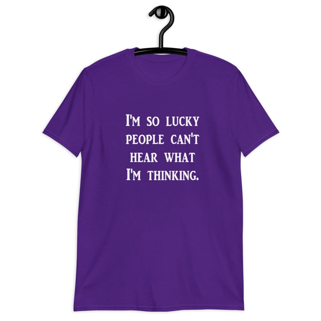 Purple t-shirt with the text 'I'm so lucky people can't hear what I'm thinking' printed on the front.