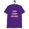 Purple t-shirt with the text 'Fuck your feelings' printed on the front in pink. There are cute pink hearts next to the words.