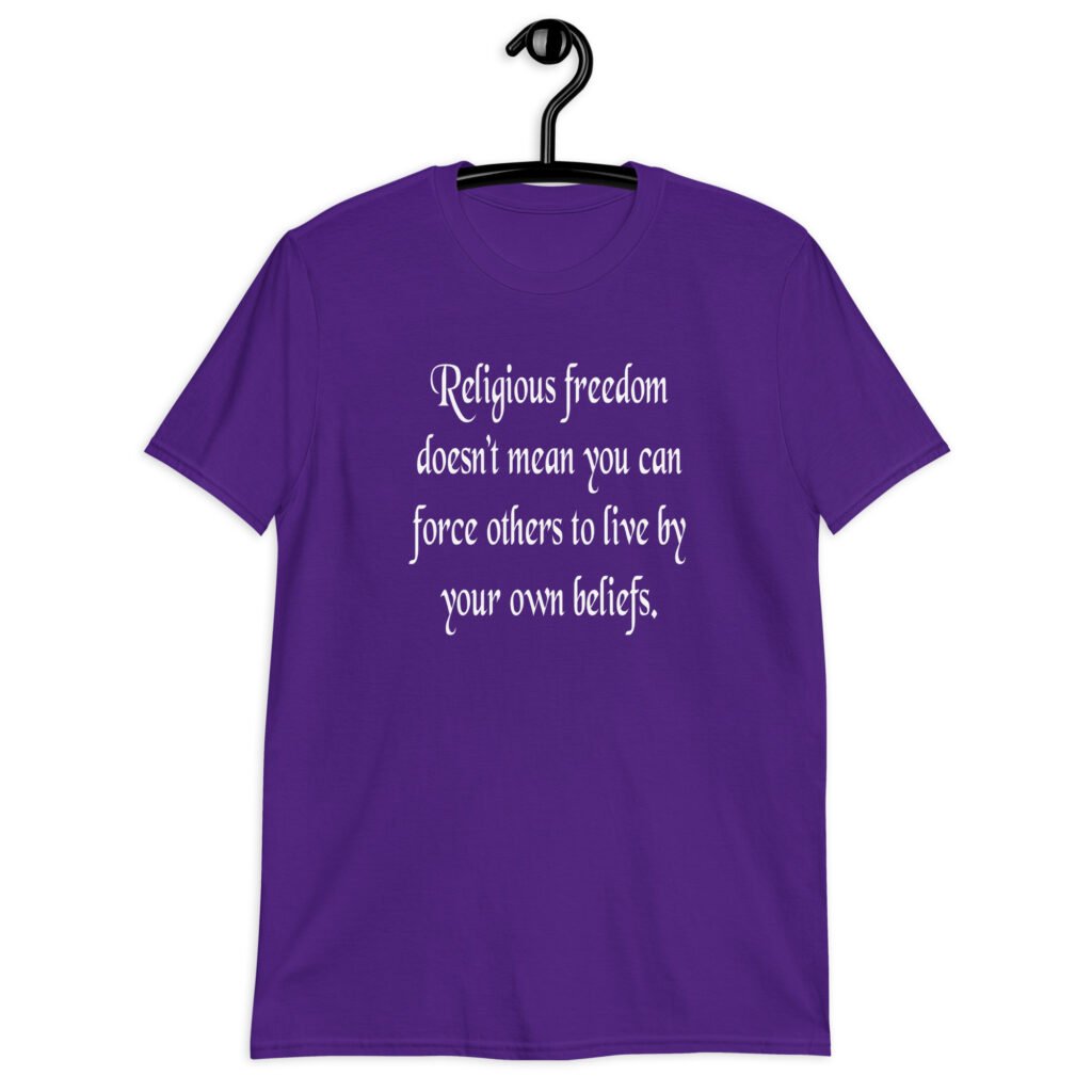 Purple t-shirt with the text 'Religious freedom doesn't mean you can force others to live by your own beliefs.' printed on the front.