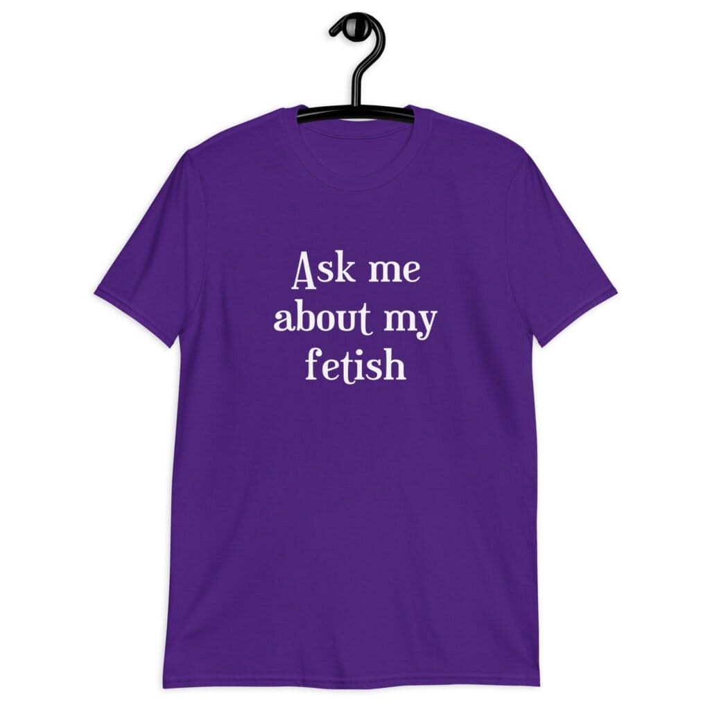 Purple t-shirt with the text 'Ask me about my fetish' printed on the front.