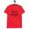 Red t-shirt with the text 'Free Hugs' printed on the front.