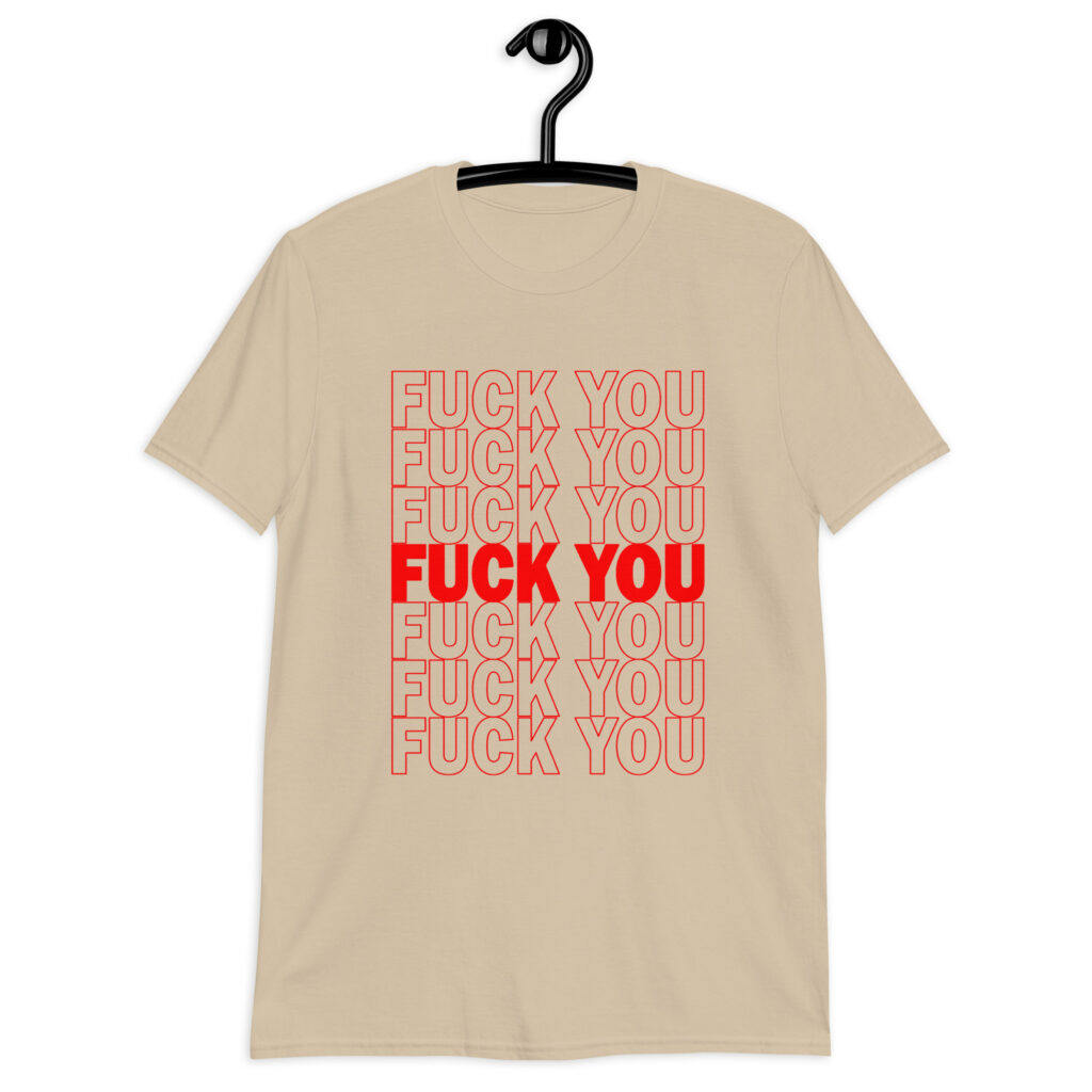 Sand color t-shirt with a parody graphic of a generic grocery store bag that traditionally have Thank you printed all over but it says Fuck you instead of Thank you. The graphics are printed in red on the front of the shirt.
