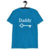 Sapphire blue t-shirt with an image of a key and the word 'Daddy' printed on the front.