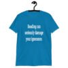 Sapphire blue t-shirt with the text 'Reading can seriously damage your ignorance.' printed on the front.