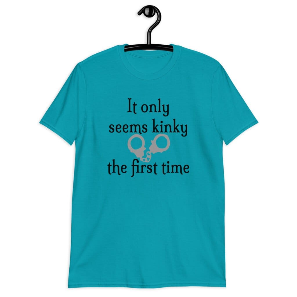 Tropical blue t-shirt with an image of handcuffs and the text 'It only seems kinky the first time' printed on the front.