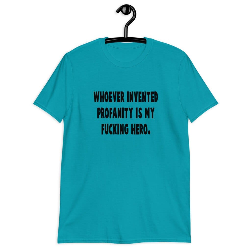Tropical blue t-shirt with the text 'Whoever invented profanity is my fucking hero.' printed on the front.