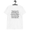 White t-shirt with the text 'Thank you for pretending not to see me while I was pretending not to see you.' printed on the front.