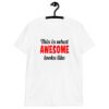 White t-shirt with the text 'This is what AWESOME looks like' printed on the front.