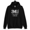 Black hoodie sweatshirt with the text 'Smile if you take it in the ass' printed on the front. The word 'smile' is large and the words 'take it in the ass' are much smaller.